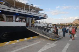 Passengers boarding cruise ship at Athens port for 1 day cruise to Hydra Poros and Aegina islands